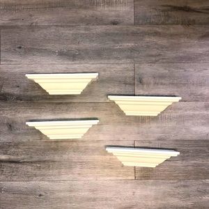 Four all white shelves  with some light little scratches